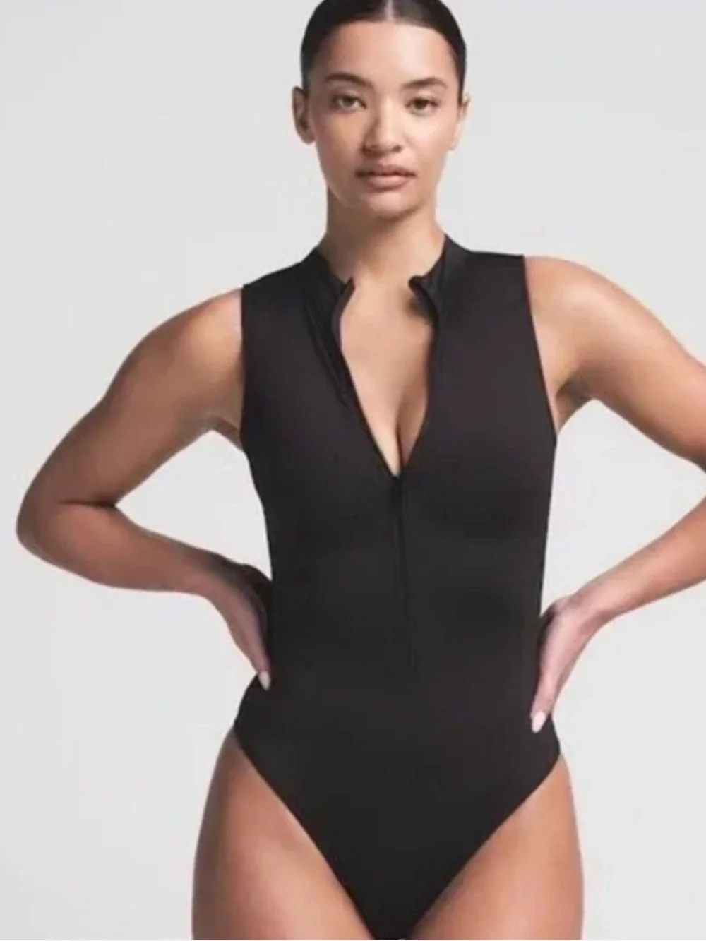 The Skims Black Zip-Front Swimsuit in Size Small